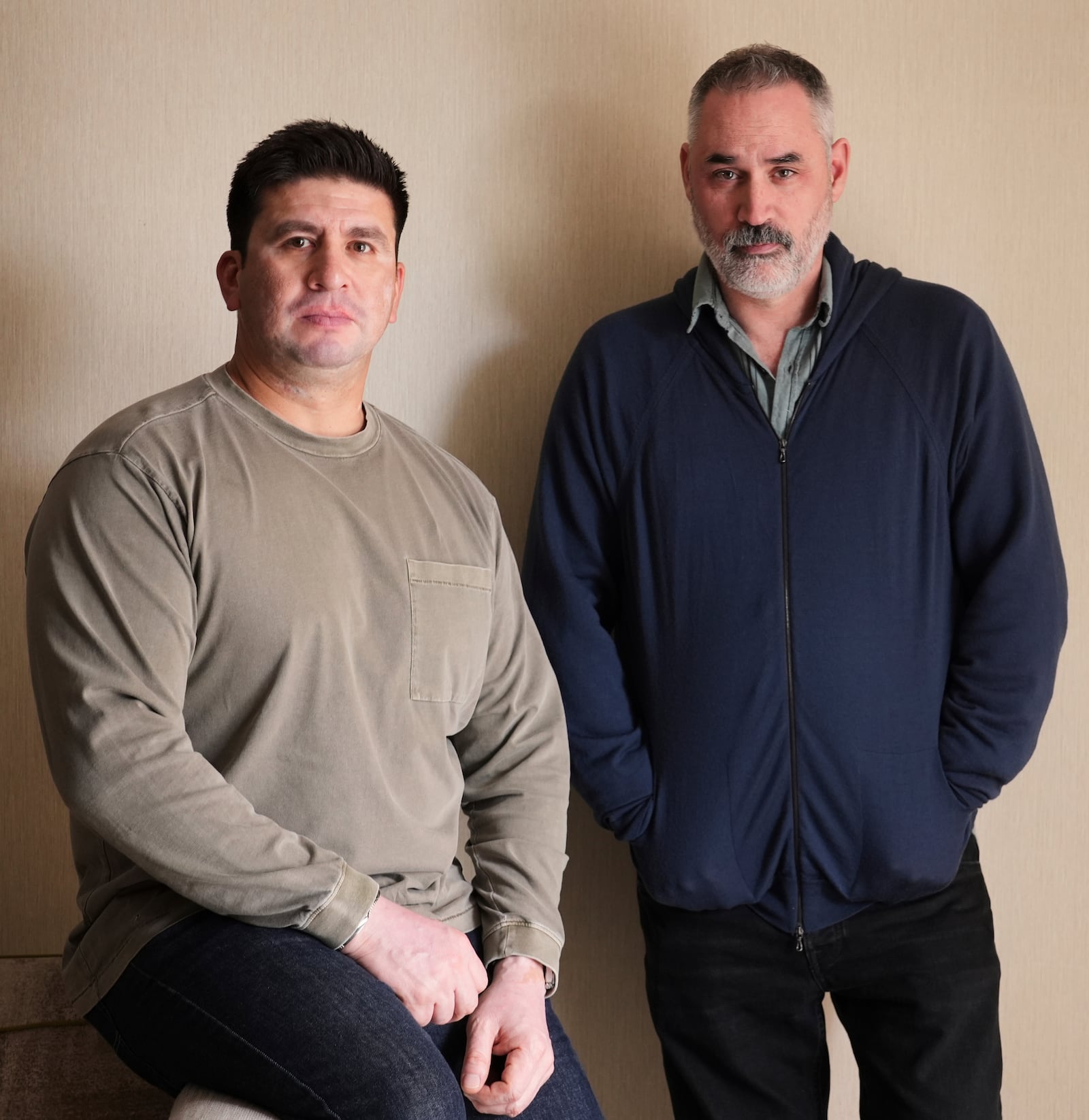 Ray Mendoza, left, and Alex Garland, co-writers and co-directors of the film "Warfare," pose together for a portrait at the London Hotel, Friday, March 28, 2025, in West Hollywood, Calif. (AP Photo/Chris Pizzello)