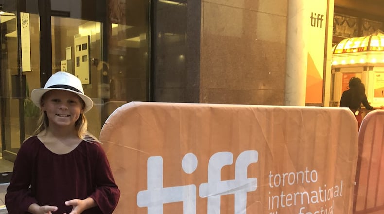 Rhyan Hanavan, 9, stands outside of the Elgin & Winter Garden Theatre where the world premiere of “Donnybrook” took place during the Toronto International Film Festival. A fourth-grader at St. John XXIII Elementary School, Rhyan was one of two children in the movie that was filmed in Middletown and throughout Butler County and greater Cincinnati. CONTRIBUTED