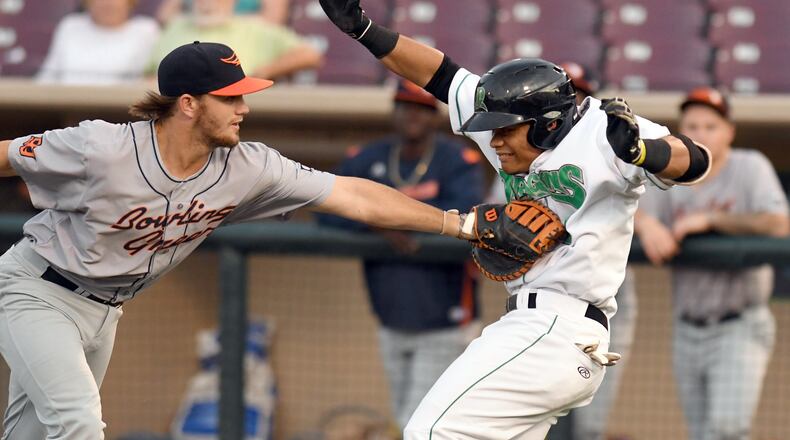 Dragons baserunner Randy Ventura tries to avoid the tag Tuesday night at Fifth Third Field. The Dragons beat the Bowling Green Hot Rods 12-0. BRANDY GUINAUGH / CONTRIBUTED