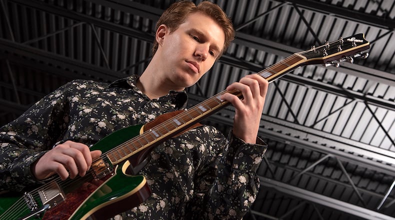 Evan Fiehrer, a Dayton-based classical guitarist, is releasing his funk ensemble’s debut LP, “A Little Light,” on Oct. 24 at The Tank in Dayton. The album was made possible with funding by a 2025 Culture Works Artist Opportunity Grant. CONTRIBUTED/DAN CLEARY