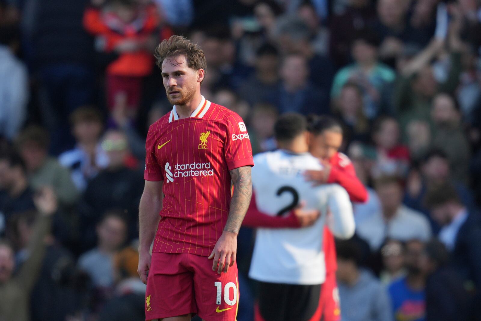 Liverpool's Alexis Mac Allister reacts disappointed after the English Premier League soccer match between Fulham and Liverpool, at Craven Cottage, London, Sunday, April 6, 2025. (AP Photo/Kin Cheung)