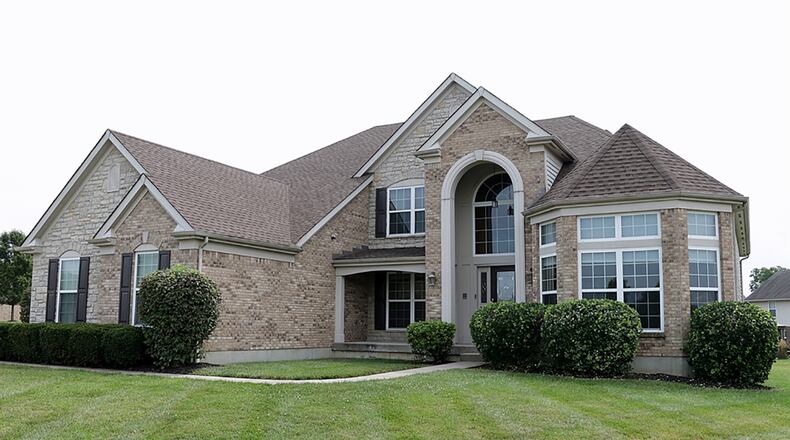 The home has about 2,820 sq. ft. of living within the two levels plus a full, finished basement. The house sits on a curve of a double cul-de-sac street on about a three-quarter-acre lot. A hexagon-shaped living room or study is nestled into a bay bump-out. CONTRIBUTED PHOTO BY KATHY TYLER