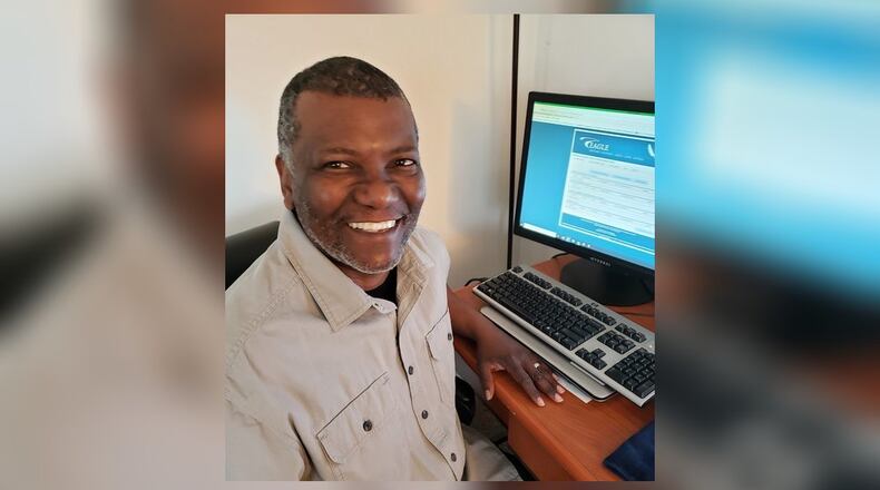 Gary Sapp, a community readiness consultant at the Airman & Family Readiness Center, helps coordinate Air Force Aid Society loans and grants to Airmen at Wright-Patterson Air Force Base. As a young Airmen with twins, he and his wife benefited from AFAS assistance. (Contributed photo)