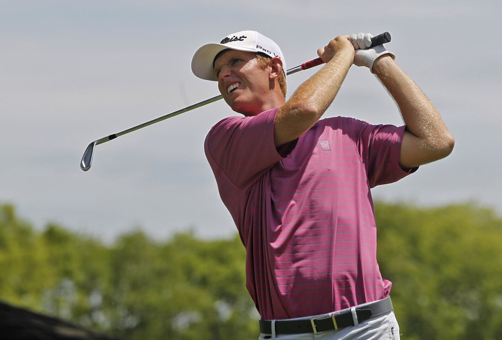 Shawnee High School graduate, Clark Engle, tees off on the third hole during the opening round of the Ohio Amateur at Springfield Country Club Tuesday, July 11, 2017. Bill Lackey/Staff