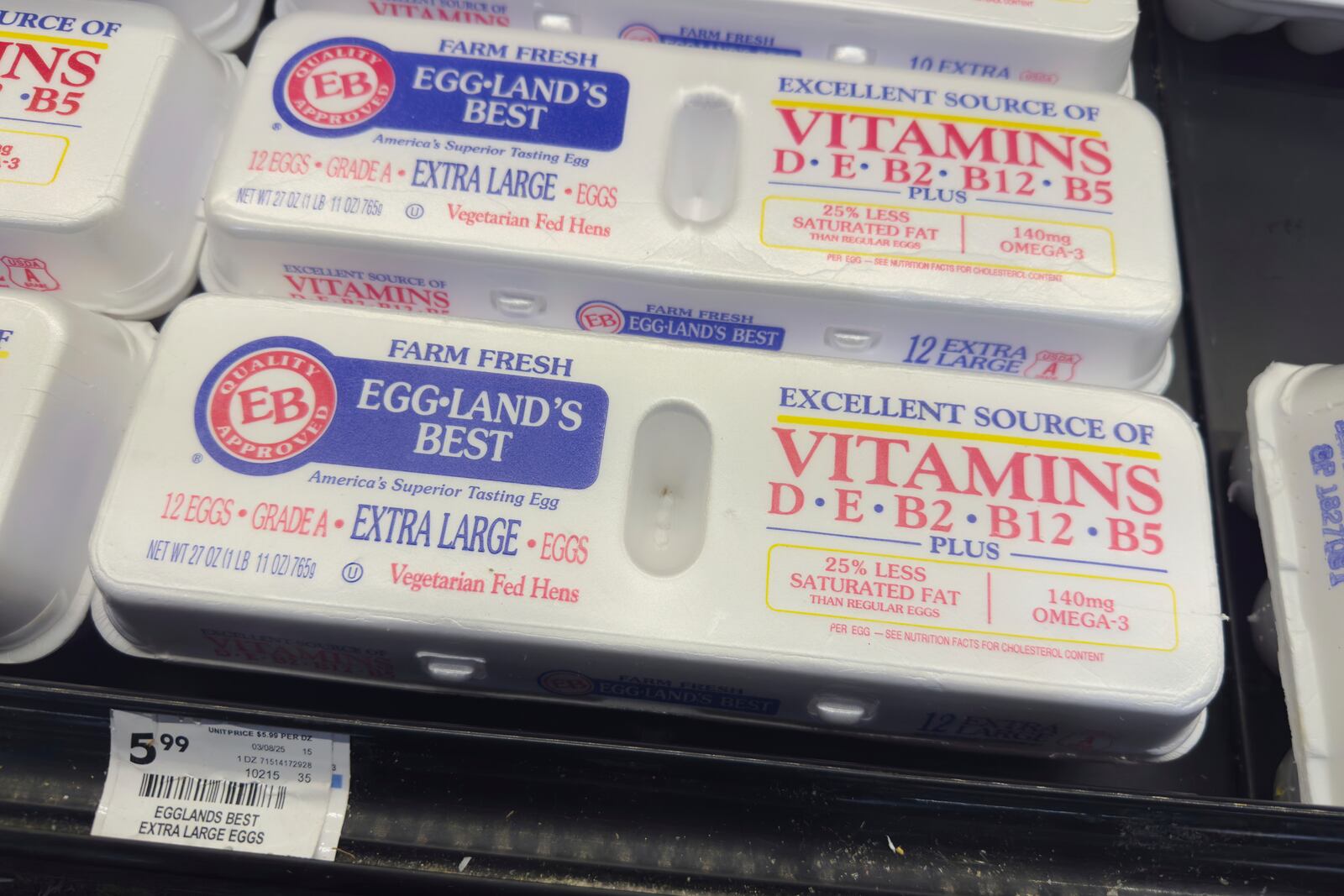 Eggs are displayed in a grocery store in Carmel, Ind., Wednesday, April 9, 2025. (AP Photo/Michael Conroy)