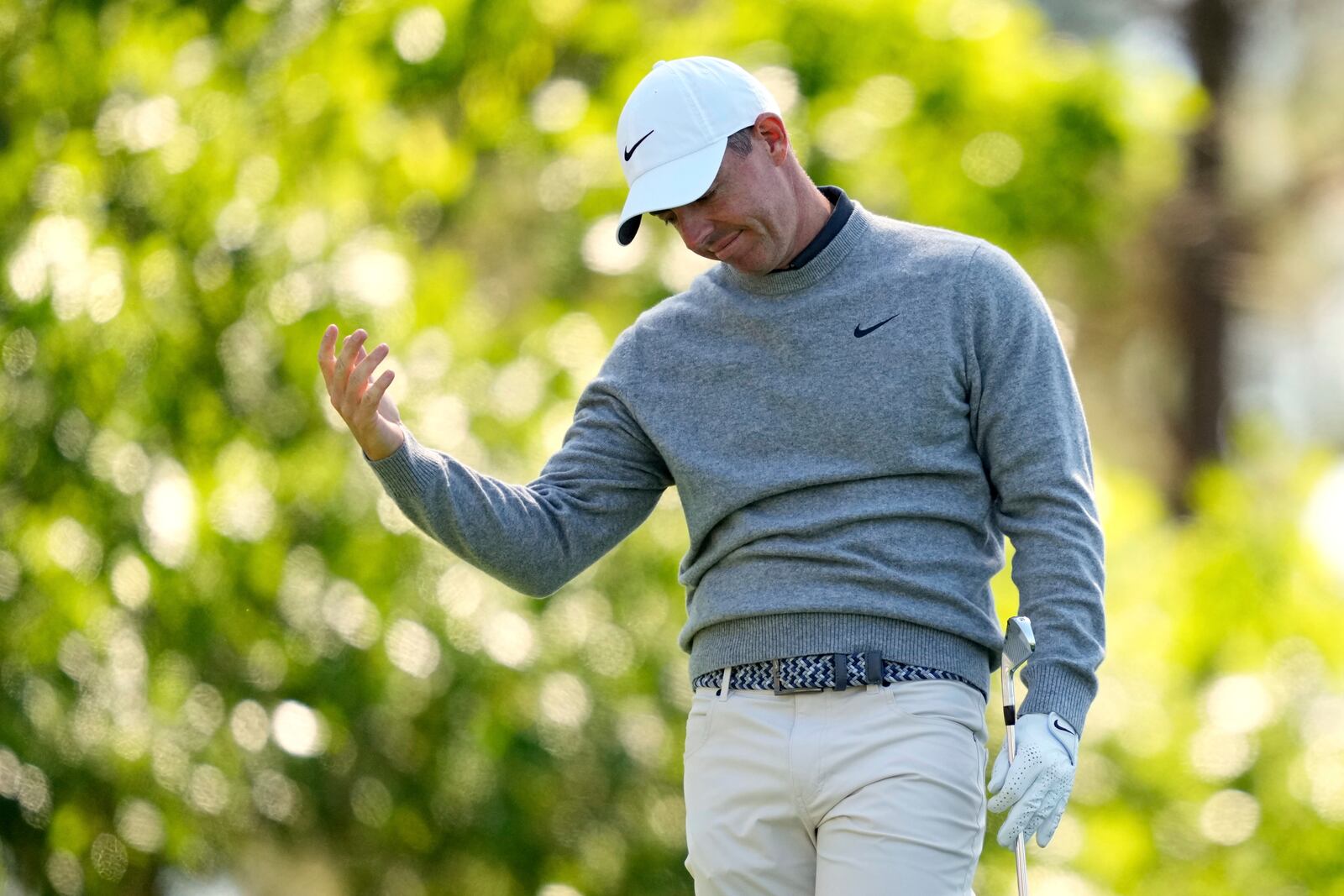 Rory McIlroy, of Northern Ireland, reacts to his tee shot on the fourth hole during the second round at the Masters golf tournament, Friday, April 11, 2025, in Augusta, Ga. (AP Photo/Julia Demaree Nikhinson)