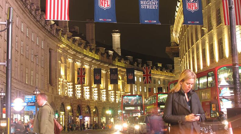 American flags and National Football League banners adorn London's Regent Street ahead of the Atlanta Falcons-Detroit Lions football game. Fans are expected to rally at Trafalgar Square in the British capital a day before Sunday's showdown at Wembley, the second of three NFL games being staged at England's national stadium this year.
