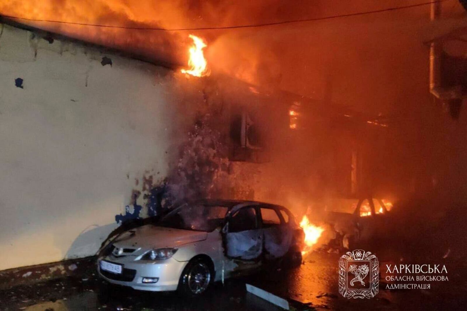 In this photo, provided by the Kharkiv regional military administration, on Wednesday, July 30, 2025, a building burns after Russian strike on Kharkiv, Ukraine. (Kharkiv regional military administration via AP)