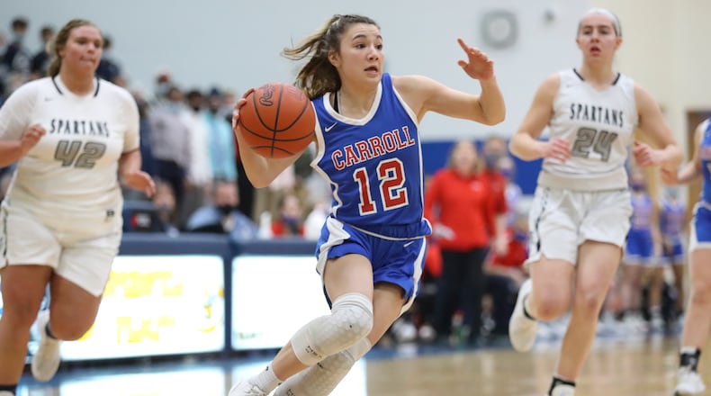 Cutline: Carroll High School's Ava Lickliter drives to the hoop during their Division II regional semifinal game against Valley View at Springfield High School on March 2, 2021. The Patriots won 45-36. Michael Cooper/CONTRIBUTED