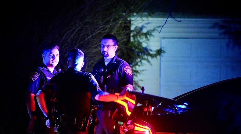 There was a heavy police presence in Yellow Springs on South High Street Thursday night, March 14, 2024, following a report of a shooting. MARSHALL GORBY \STAFF