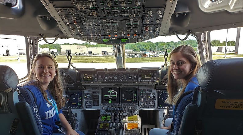 Premier College Intern Program interns Sarah Earnesty, left, and Kayleigh Brown explore the cockpit of a C-17 during part of their three-day symposium at Wright-Patterson Air Force Base. The symposium was hosted by the Air Force Personnel Center at the Holiday Inn in Fairborn, Ohio, June 25-27. (Contributed photo)