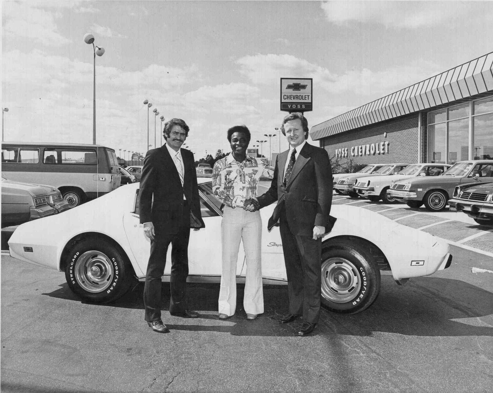 Jim Mills, Cincinnati Reds second baseman Joe Morgan and Voss Auto Network co-founder John Voss. CONTRIBUTED