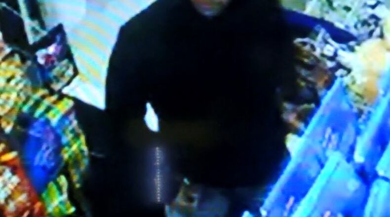 A surveillance video image of a suspect in a recent armed robbery in Middletown. Reports from police departments to the FBI show Dayton had one of the highest burglary rates in the country in 2016, though police say the numbers are misleading. Police say drug use is a big factor in the number of burglaries. Contributed photo.