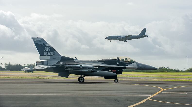 An F-16 Fighting Falcon assigned to the 18th Aggressor Squadron taxis down the flightline Jan. 17 at Joint Base Pearl Harbor-Hickam, Hawaii, during exercise Sentry Aloha 20-1. The Fighting Falcon, and other combat aircraft, received in-air refueling from KC-135 Stratotankers assigned to the Wisconsin Air National Guard throughout a series of dissimilar-air-combat-training missions. Sentry Aloha is a Hawaii Air National Guard-led exercise that provides participants a multi-faceted, joint venue with supporting infrastructure and personnel. (U.S. Air National Guard photo/Senior Airman John Linzmeier)