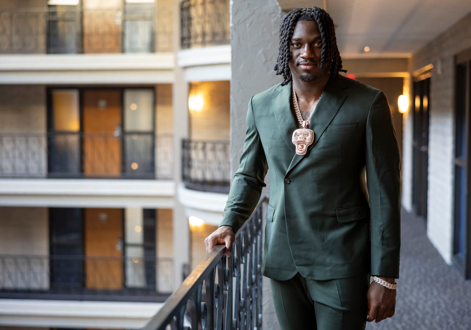 Texas A&M edge rusher Shemar Stewart tries on a suit from designer Baynes + Baker ahead of the NFL Draft, Wednesday, April 23, 2025, in Green Bay, Wis. (AP Photo/Matt Ludtke)