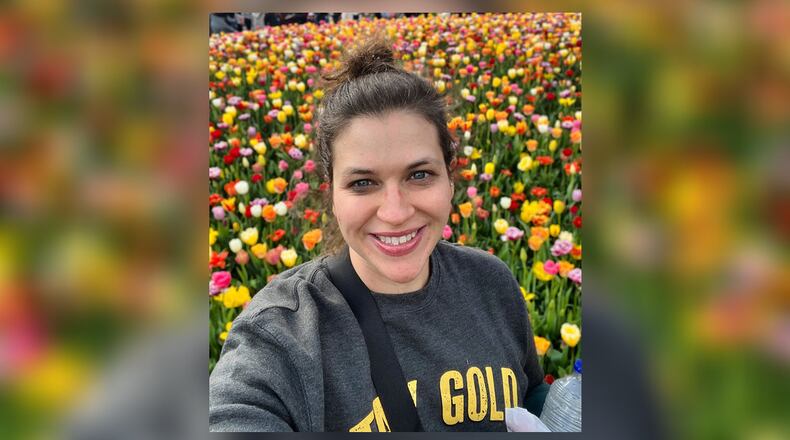 Abigael Kaszar loves to travel since starting her career as a travel nurse 11 years ago. She is shown here last year in the Netherlands. CONTRIBUTED