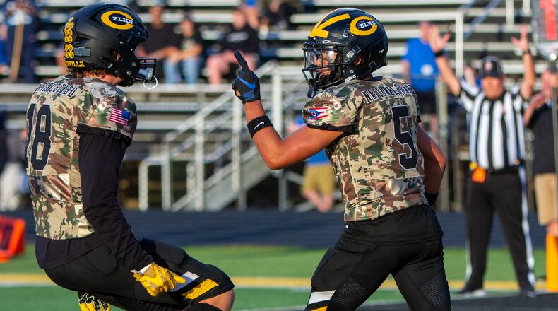Centerville's Braylon Newcomb scored three touchdowns out of the Wildcat formation in Friday night's 27-14 home victory over Miamisburg. Jeff Gilbert/CONTRIBUTED