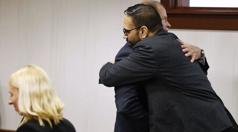 The retrial of Gurpreet Singh started Monday morning, April 29, 2024 before a 3-judge panel in Butler County Common Pleas Court in Hamilton. Singh hugged his defense attorney Thursday, May 9 when the defense rested its case. He is charged with capital murder for allegedly killing 4 members of his family in 2019 in West Chester Township. NICK GRAHAM/STAFF