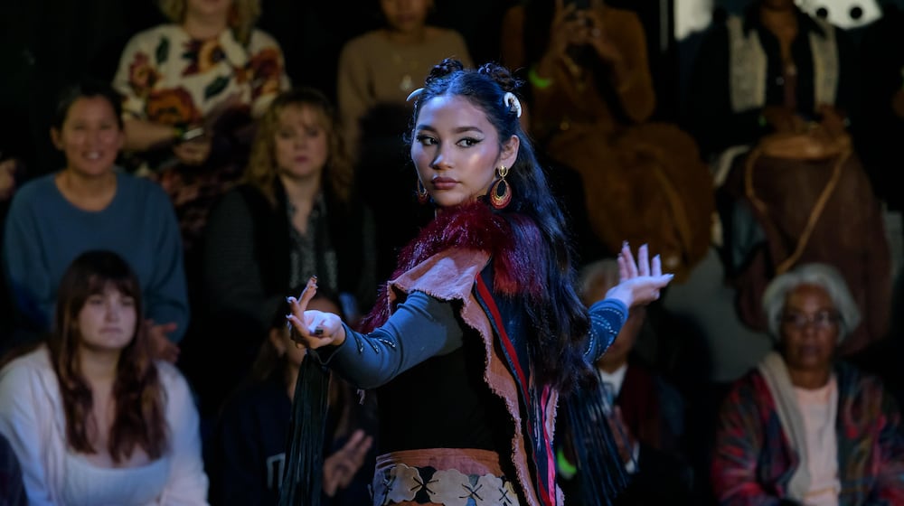 The first Four Winds Great Miami Indigenous Fashion Show happened in The Tank inside the Dayton Arcade on Sunday, Nov. 9, 2025. Conceived and spearheaded by published model and makeup artist Ruby Redfox Irwin, a member of the Haliwa-Saponi tribe, the show featured five designers, 25 models and 12 ladies from the Native American Women Warriors. The sold-out event also featured an artisan faire plus an immersive experience during intermission focusing on Native American traditions. TOM GILLIAM / CONTRIBUTING PHOTOGRAPHER