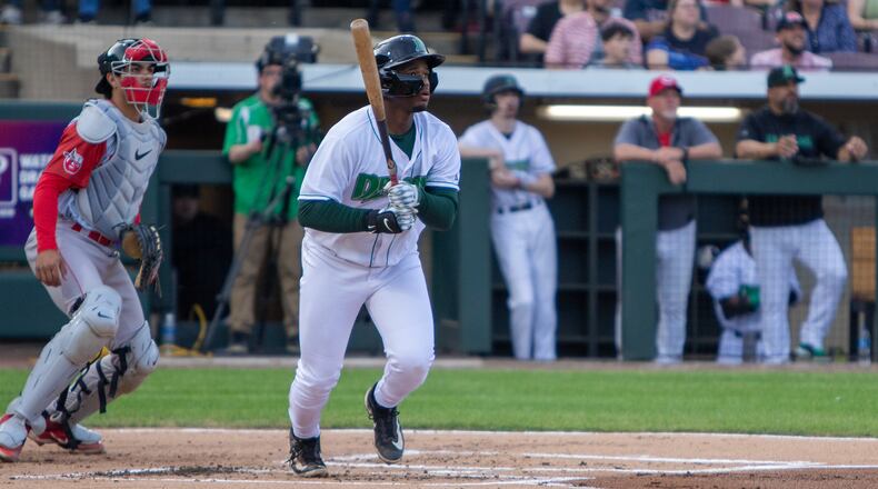 Cam Collier watches one his league-leading seven home runs during the Dragons recent homestand against Fort Wayne. Jeff Gilbert/CONTRIBUTED