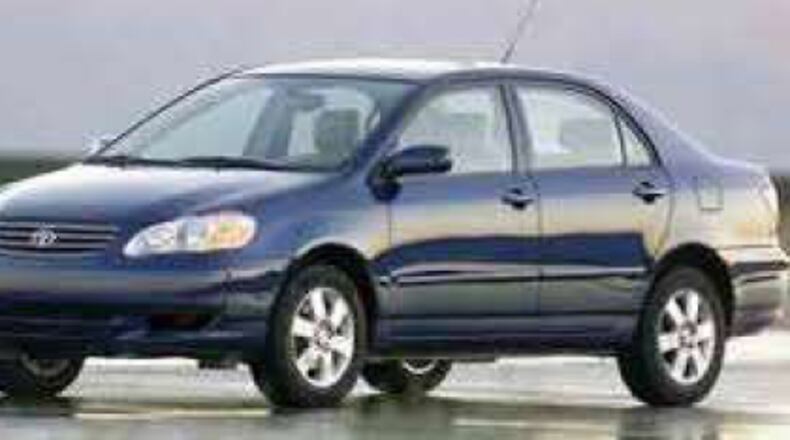 2003 blue Toyota Corolla (not actual suspect car)