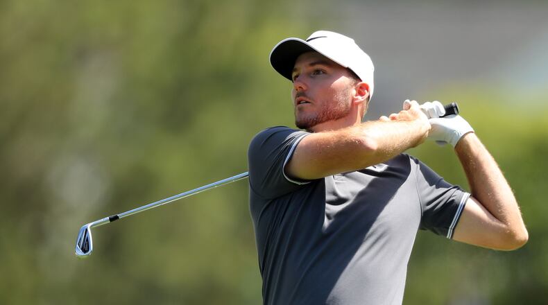 April 8, 2017 AUGUSTA Russell Henley hits his shot from the fairway to the 1st green. Play begins in the third round of the 81st Masters tournament at the Augusta National Golf Club, Saturday, April 8, 2017. CURTIS COMPTON/ AJC