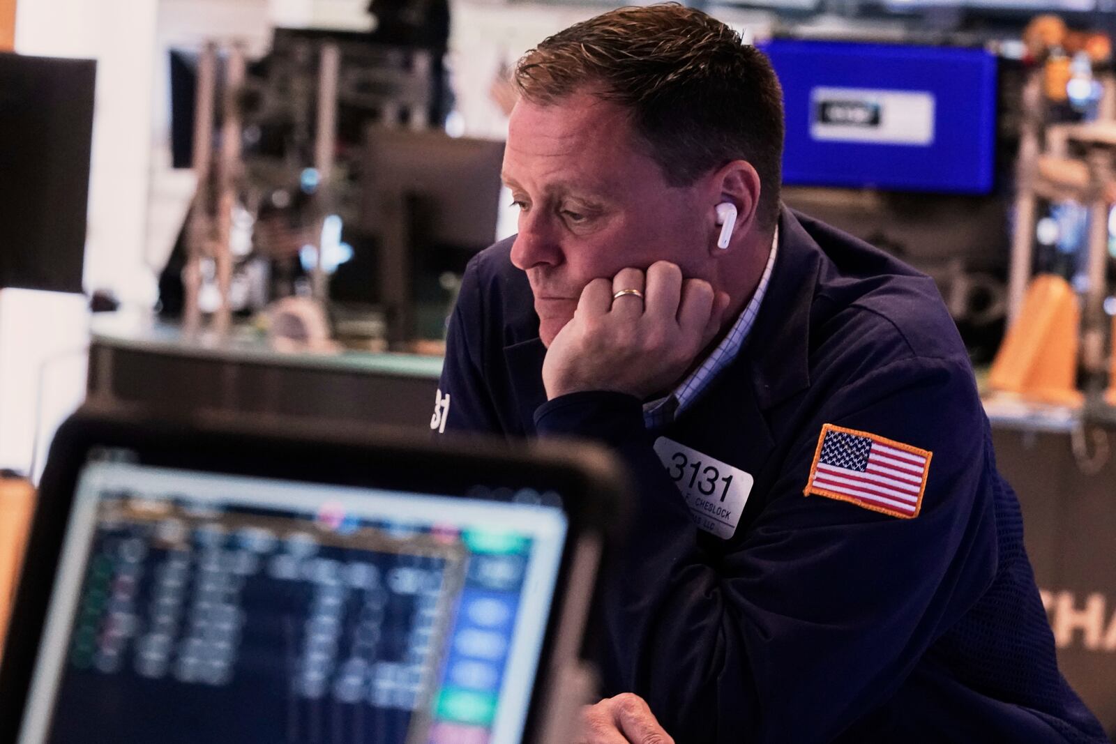 Trader Matt Chellock works on the floor of the New York Stock Exchange, Thursday, April 10, 2025, New York. (AP Photo/Richard Drew)