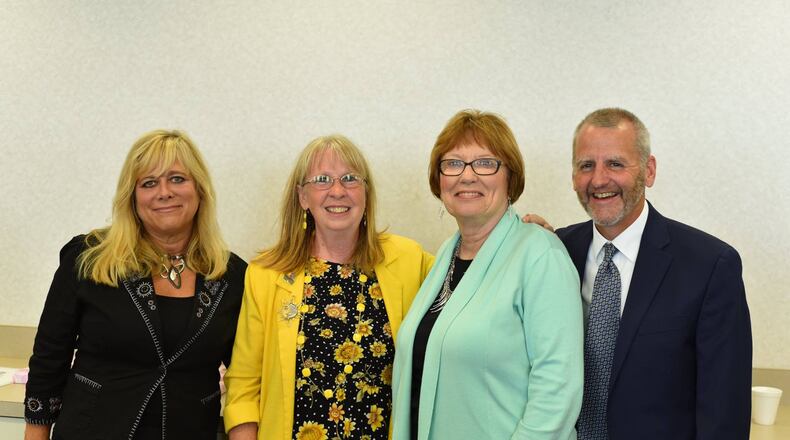 Pictured Left to Right: Montgomery County Commission President Debbie Lieberman, Gayle Ingram, commissioners Judy Dodge and Dan Foley