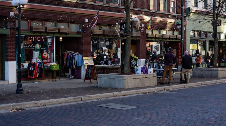 Here's a look at Small Business Saturday in downtown Dayton, the kickoff to the holiday shopping season, held on November 28, 2020. TOM GILLIAM/CONTRIBUTING PHOTOGRAPHER