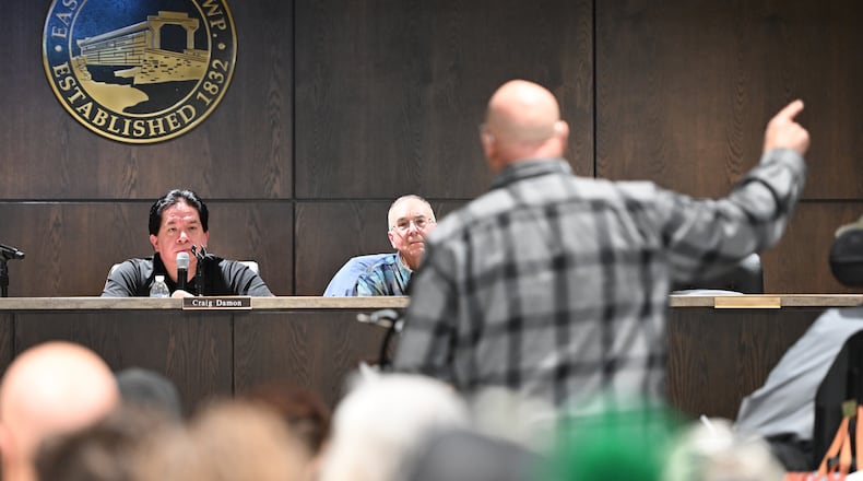Mike Petak of Spring City gestures while speaking to East Vincent Township supervisors in opposition to a data center proposal at the former Pennhurst state hospital grounds, Dec. 17, 2025, in Spring City, Pa. (AP Photo/Marc Levy)