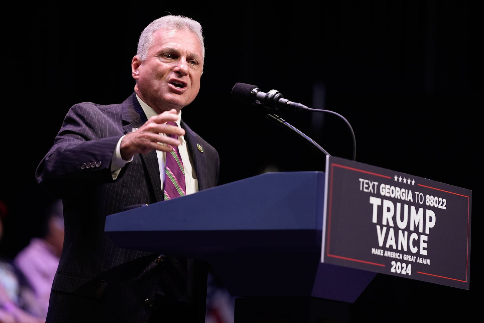 FILE - Rep. Buddy Carter, R-Ga., speaks before Republican presidential candidate former President Donald Trump arrives to deliver remarks on the tax code, and manufacturing at the Johnny Mercer Theatre Civic Center, Sept. 24, 2024, in Savannah, Ga. (AP Photo/Evan Vucci, File)