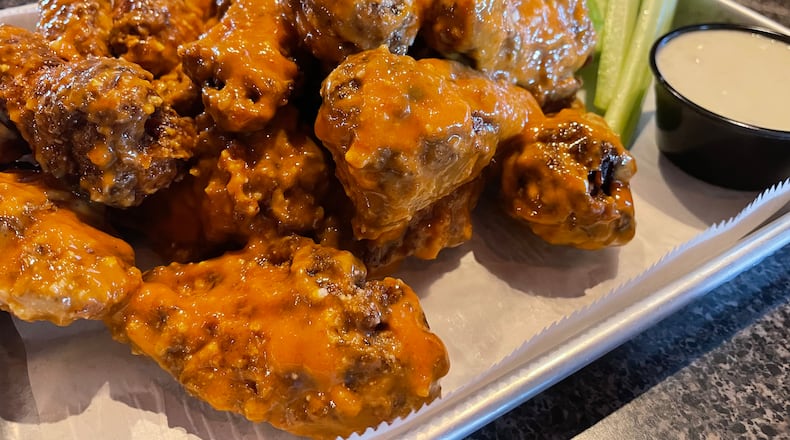 Archer’s Tavern is located at 9496 Dayton-Lebanon Pike in Centerville and 2030 E. Dorothy Lane in Kettering. Pictured is their Archer's Style wings (NATALIE JONES/STAFF)