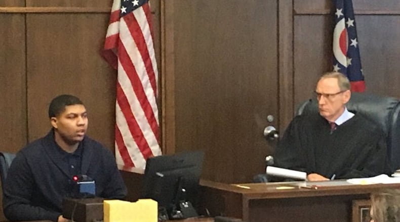 Kylen Gregory is shown testifying as Judge Dennis Langer listens. STAFF/NICK BLIZZARD