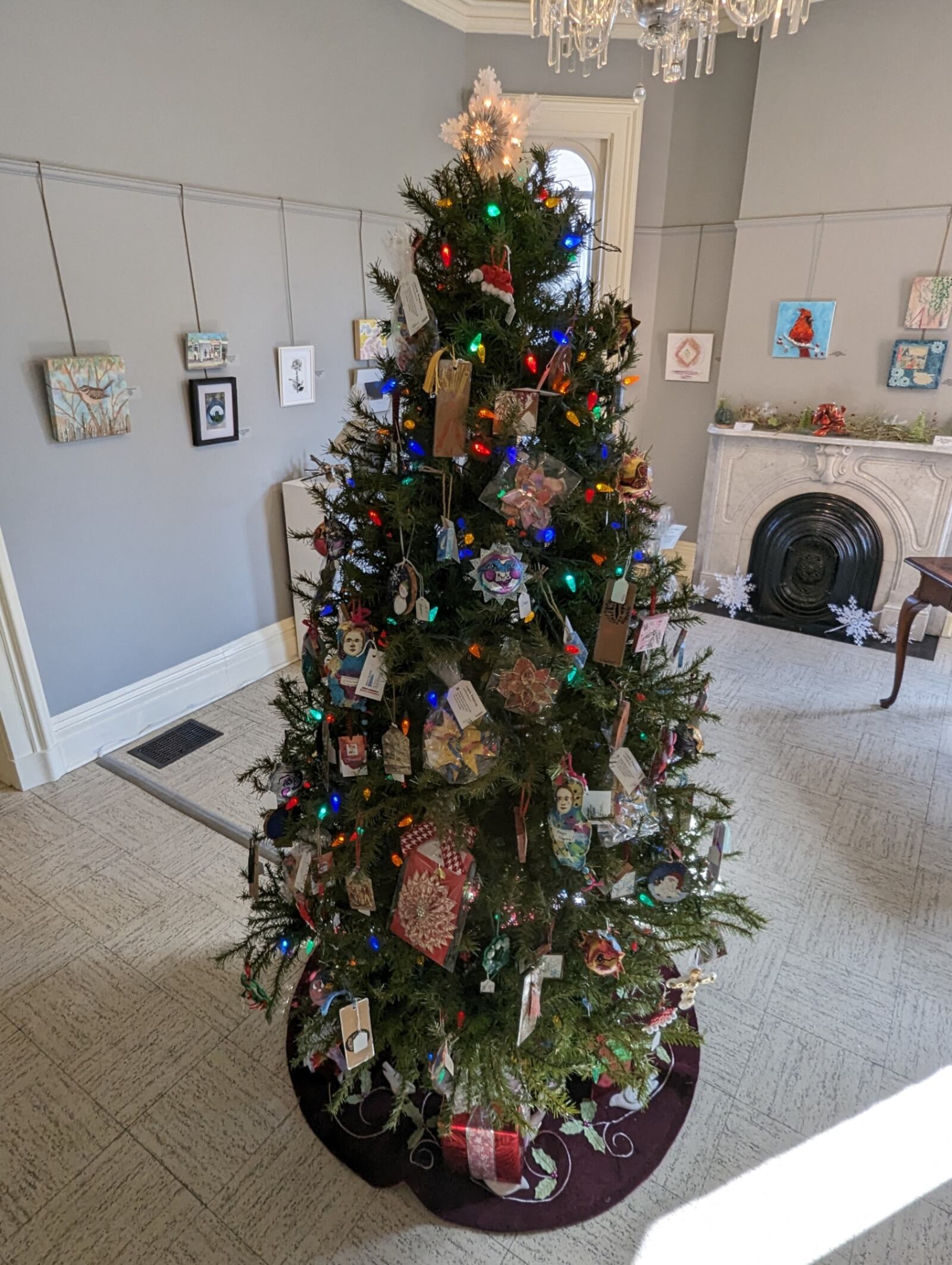 Various artists decorated the Christmas tree on display at the Dayton Society of Artists' presentation of "Small but Mighty." CONTRIBUTED