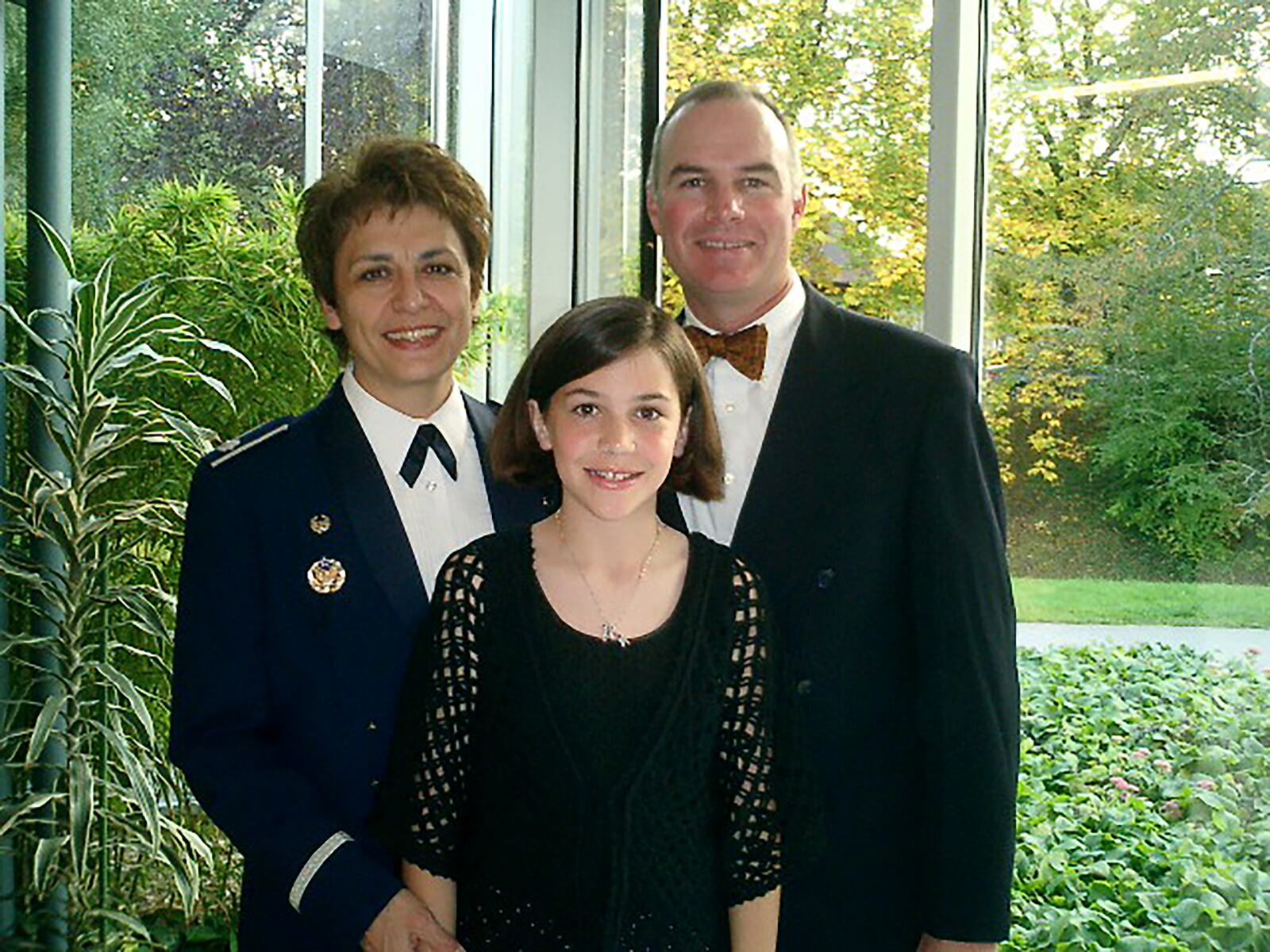 Cassie Barlow with daughter Emma and husband Tim at the annual Air Force Ball in 2007. CONTRIBUTED