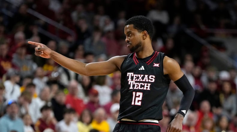 Texas Tech forward Donovan Atwell reacts after making a three-point basket during the first half of an NCAA college basketball game against Iowa State, Saturday, Feb. 28, 2026, in Ames, Iowa. (AP Photo/Charlie Neibergall)