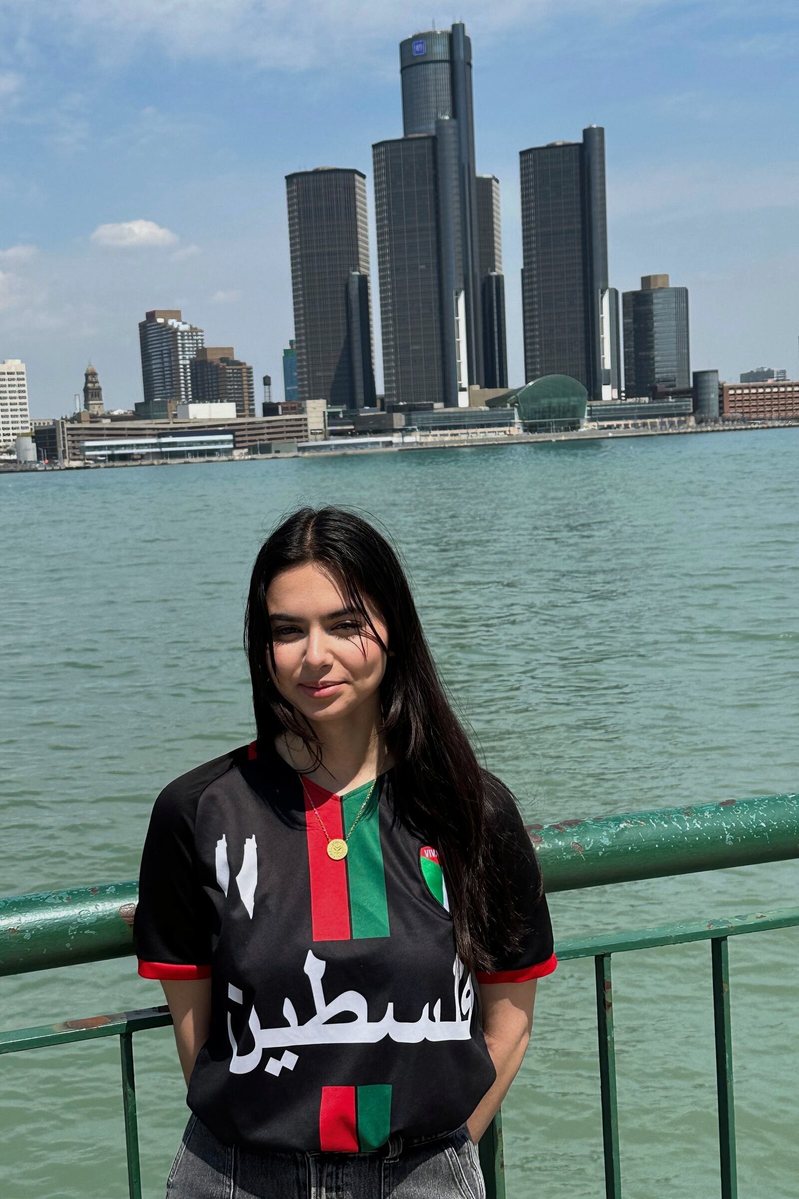 Yara Alfaqeeh, 20, stands along the Windsor, Ontario, Canada side of the Detroit River on Wednesday, April 23, 2025. (AP Photo/Corey R. Williams)