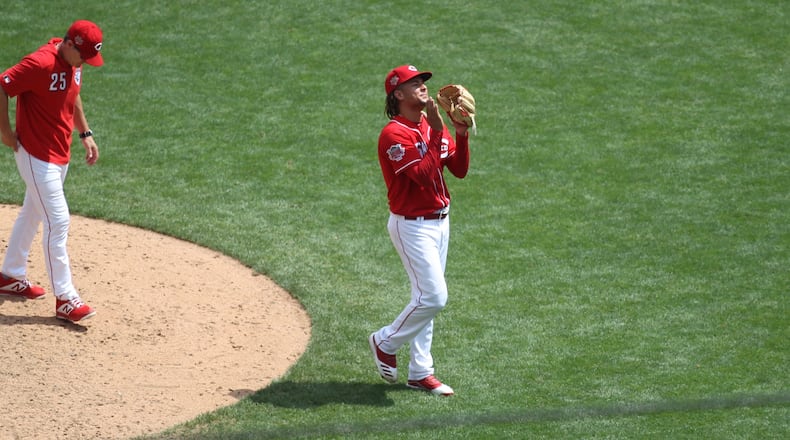 Reds starter Luis Castillo leaves the mound in the eighth inning during a game against the Pirates on Wednesday, July 31, 2019, at Great American Ball Park in Cincinnati.