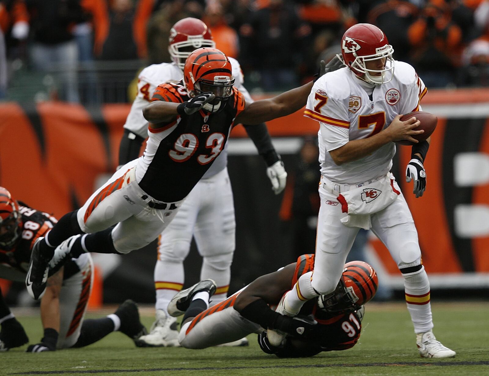 CINCINNATI - DECEMBER 27: Matt Cassel #7 of the Kansas City Chiefs is sacked by Michael Johnson #93 and Robert Geathers #91 of the Cincinnati Bengals in their NFL game at Paul Brown Stadium December 27, 2009 in Cincinnati, Ohio. (Photo by John Sommers II/Getty Images)