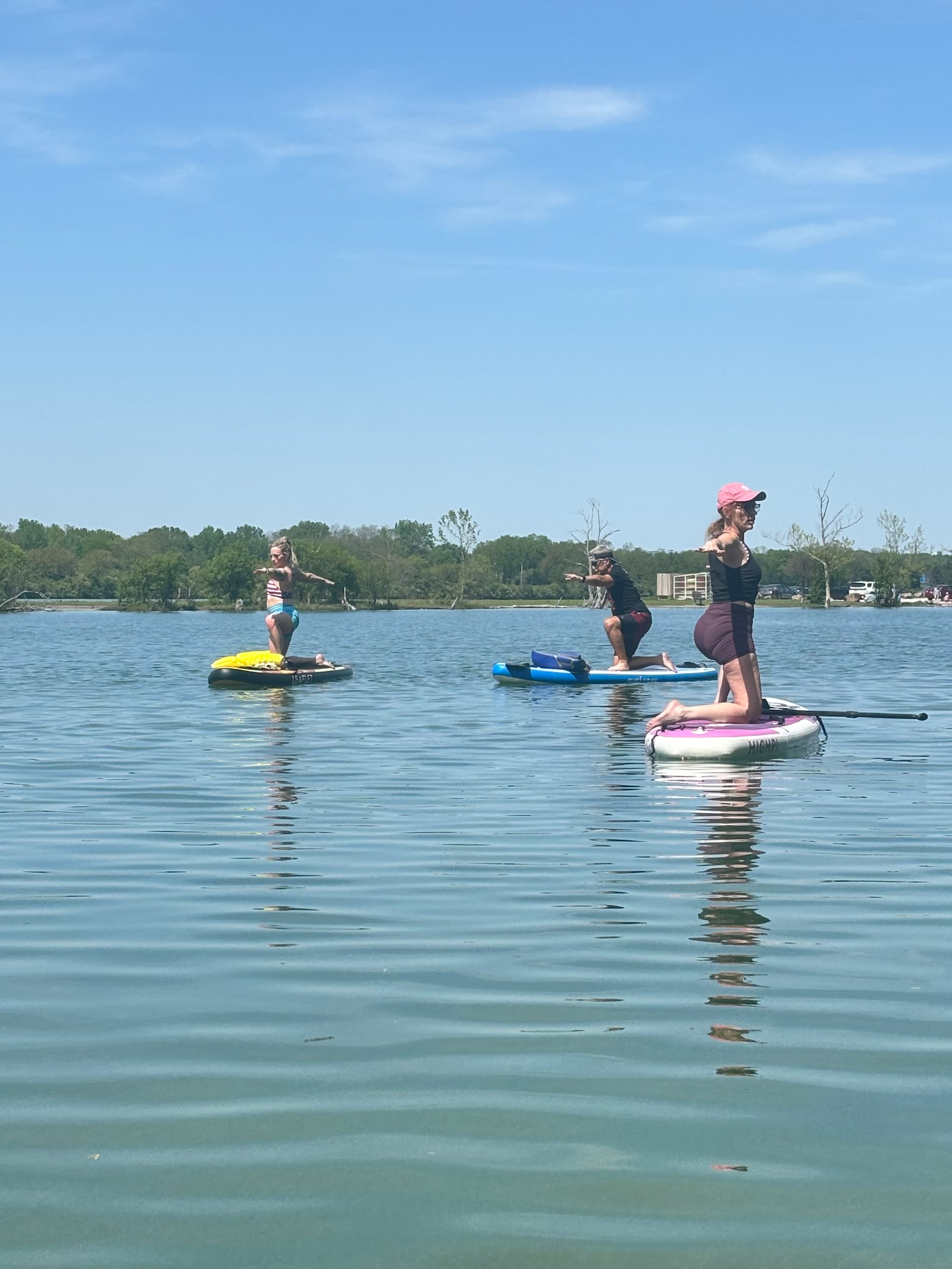 Stand Up Paddleboard Yoga is one of several offerings of Satsang Yoga & Wellness - CONTRIBUTED
