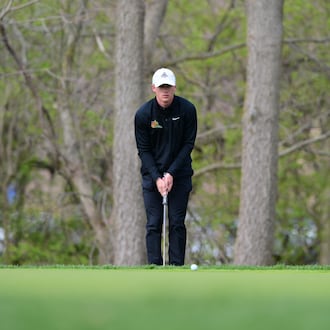 Wright State golfer Shane Ochs reads a green during the Wright State Invitational on April 13, 2025 at Heatherwood Golf Club in Springboro. Joe Craven/CONTRIBUTED PHOTO
