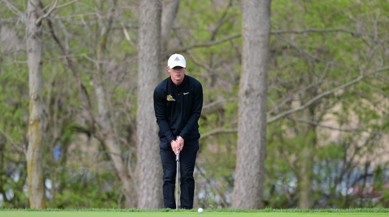 Wright State golfer Shane Ochs reads a green during the Wright State Invitational on April 13, 2025 at Heatherwood Golf Club in Springboro. Joe Craven/CONTRIBUTED PHOTO
