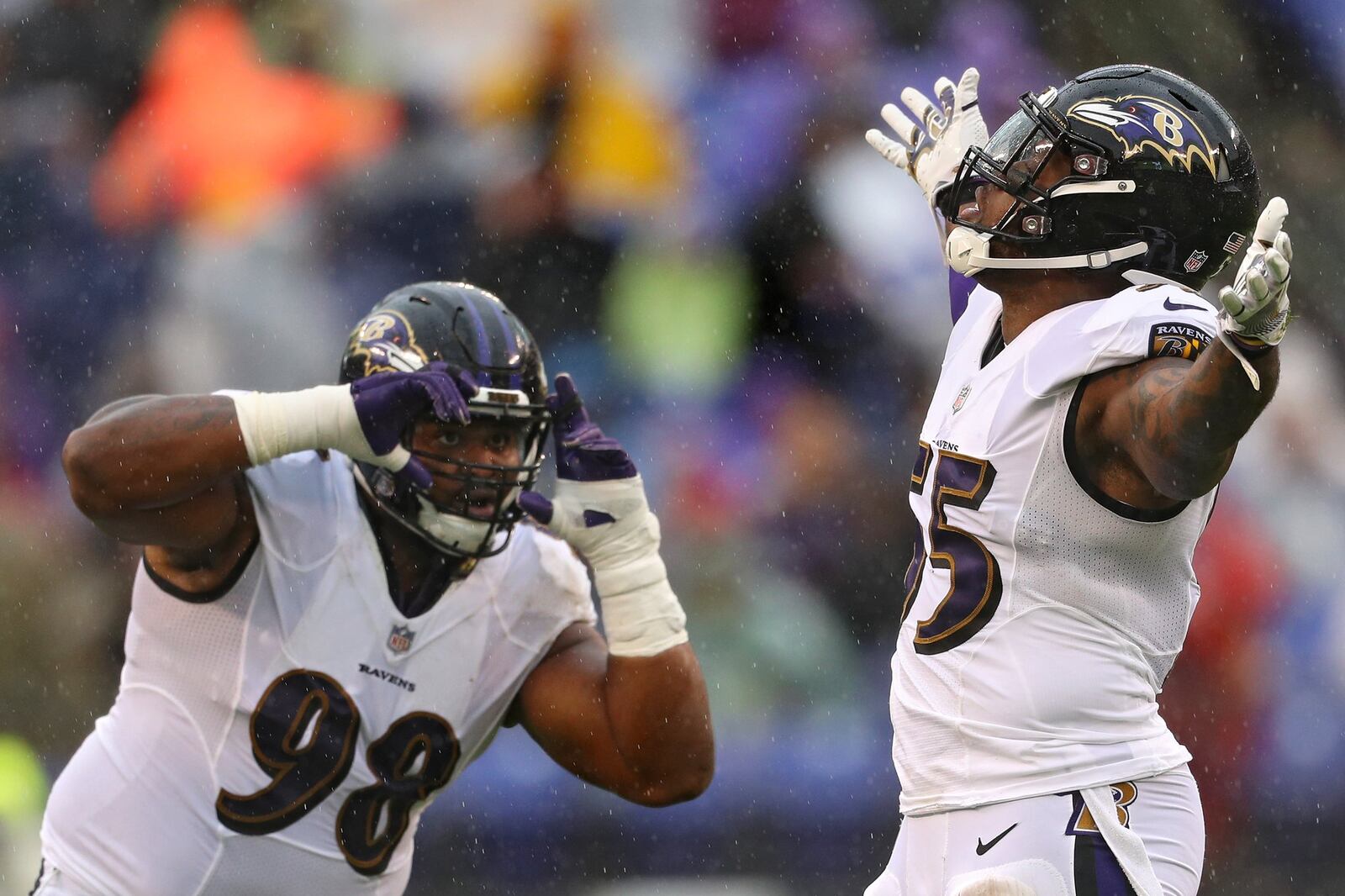 BALTIMORE, MD - SEPTEMBER 09: Brandon Williams #98 pretends to photograph teammate linebacker Terrell Suggs #55 of the Baltimore Ravens after his sack on quarterback Nathan Peterman #2 of the Buffalo Bills (not pictured) in the second quarter at M&T Bank Stadium on September 9, 2018 in Baltimore, Maryland. (Photo by Patrick Smith/Getty Images)
