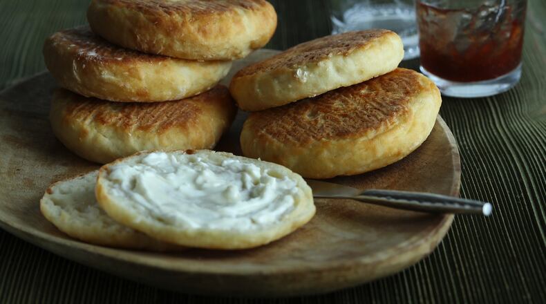 English muffins made with the two-ingredient dough method are simple enough that you could bake a batch for breakfast. (E. Jason Wambsgans/Chicago Tribune/TNS)