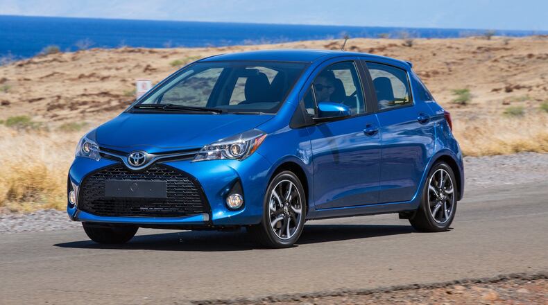 The 2016 Toyota Yaris comes in L, LE and SE grades. Standard features include air conditioning, power steering, tilt steering wheel, power door locks with illuminated entry, cargo area cover and lamp, and power windows with driver s side auto up/down. The Yaris LE adds power mirrors, cruise control, steering wheel audio controls, and a remote keyless entry system with engine immobilizer. Photo by Toyota