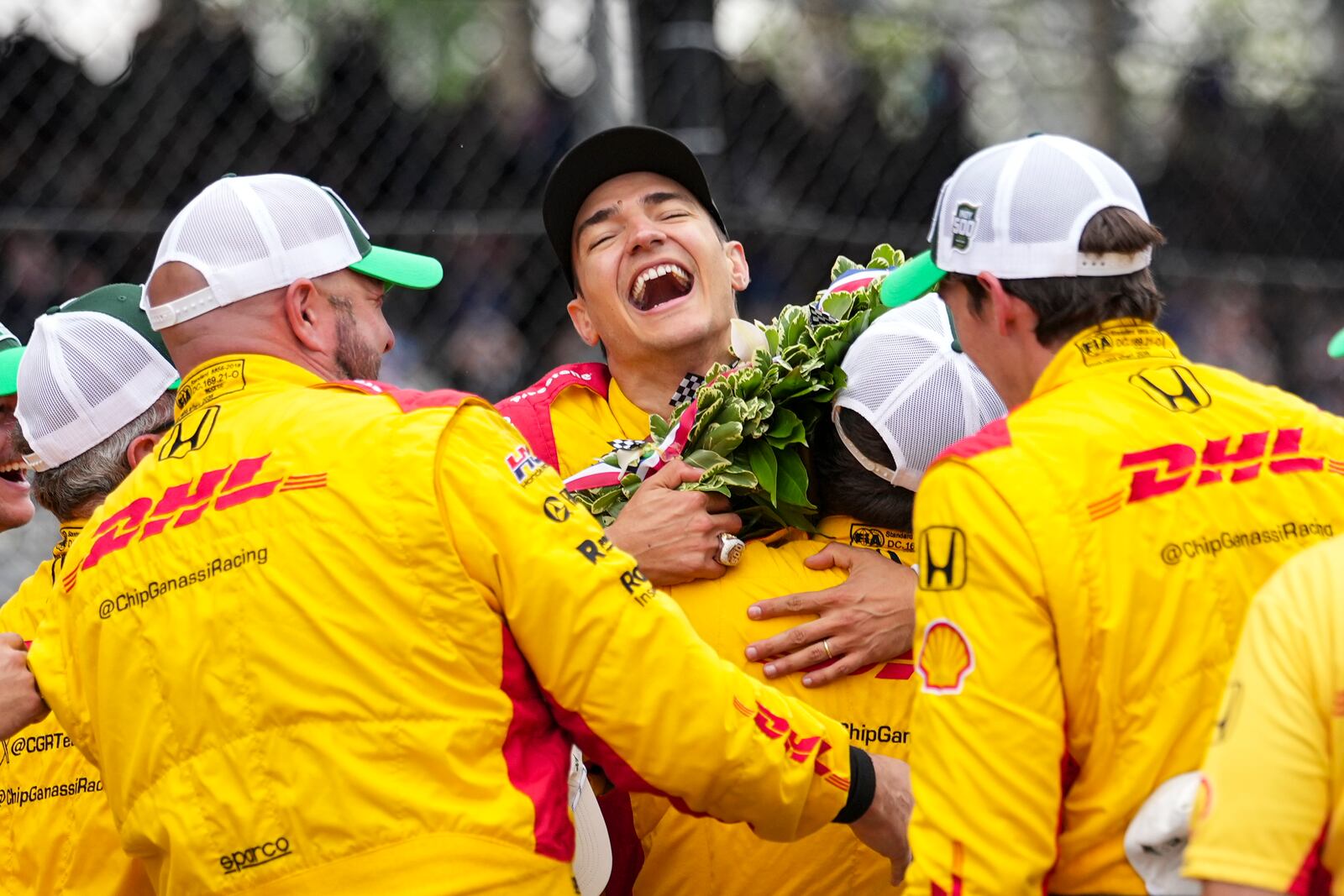 Alex Palou, of Spain, celebrates with his crew after winning the Indianapolis 500 auto race at Indianapolis Motor Speedway in Indianapolis, Sunday, May 25, 2025. (AP Photo/AJ Mast)