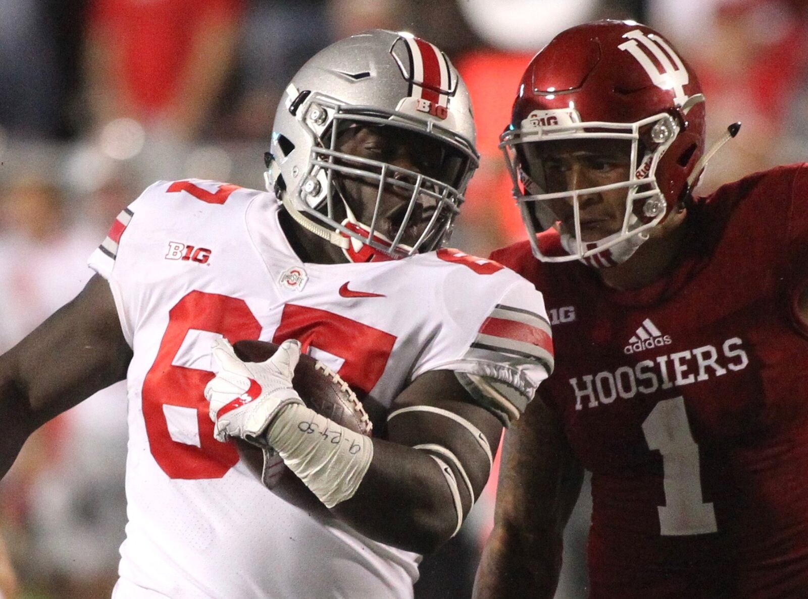 Ohio State’s Robert Landers returns a fumble for a touchdown against Indiana on Thursday, Aug. 31, 2017, at Memorial Stadium in Bloomington, Ind. The fumble was overturned on review. David Jablonski/Staff