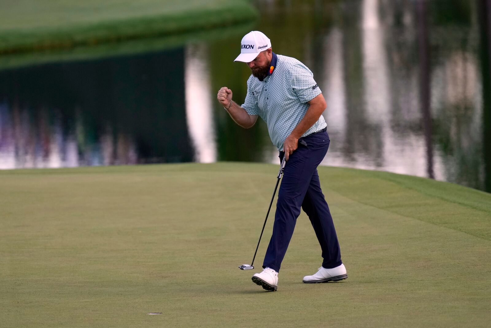 Shane Lowry, of Ireland, reacts after making a putt on the 16th hole during the third round at the Masters golf tournament, Saturday, April 12, 2025, in Augusta, Ga. (AP Photo/George Walker IV)