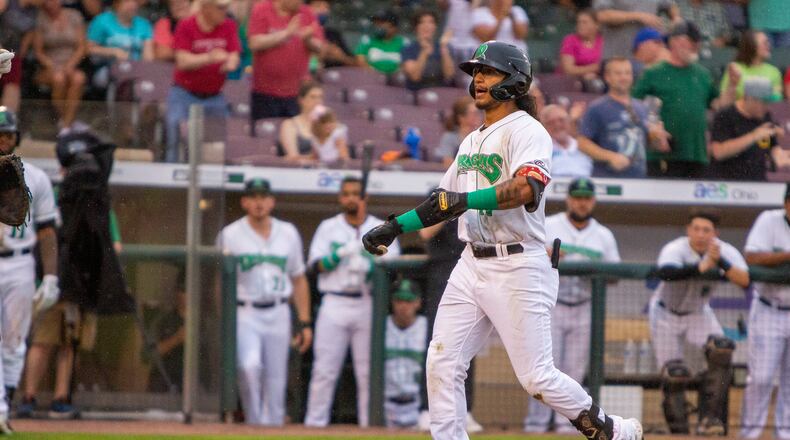 Dragons outfielder Quincy McAfee crosses home plate after a two-run homer in the fourth inning Tuesday night against Great Lakes for the Dragons' first runs. Jeff Gilbert/CONTRIBUTED
