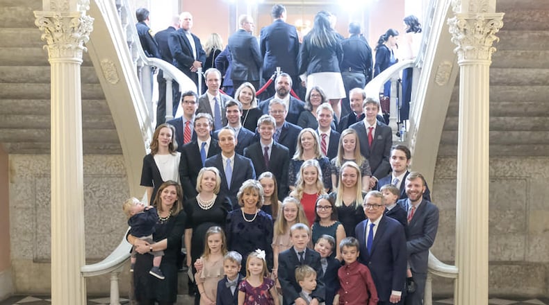 Ohio Gov. Mike DeWine, first lady Fran DeWine and their family at the inauguration on Monday.